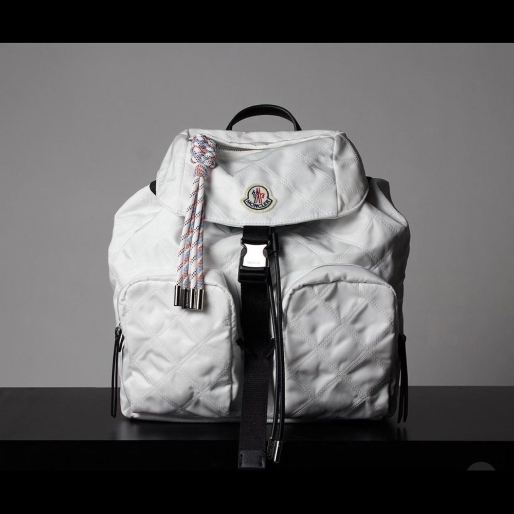 Not for sale!!! Looking for this Moncler bag.